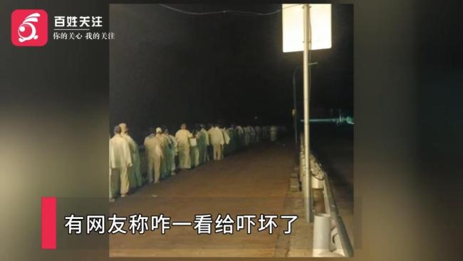 官方谈多人凌晨白衣列队行走 辟谷活动引关注